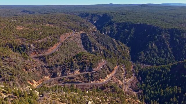 Winding switchback road of Arizona climbs through Oak Creek Canyon connecting Flagstaff and Sedona in Arizona