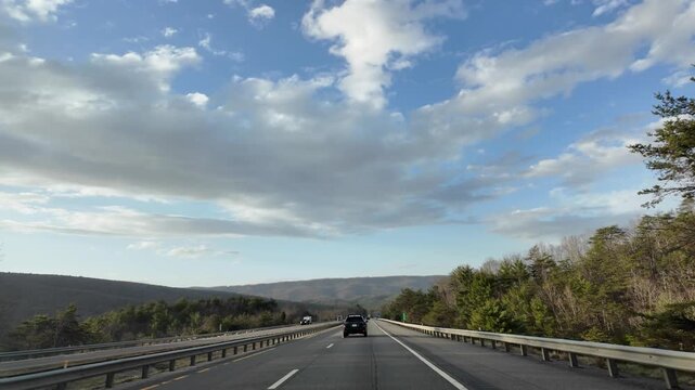 Driving Through Appalachian Mountains During Sunset Skies