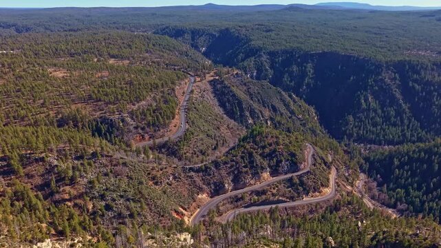Winding switchback road of Arizona climbs through Oak Creek Canyon connecting Flagstaff and Sedona in Arizona