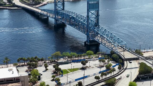 Aerial footage of cars driving on a bridge in Jacksonville Florida USA