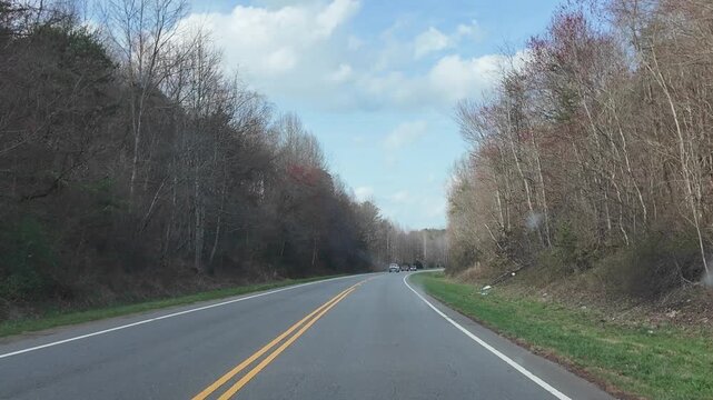 Driving Through a Forested Area in North Carolina During Spring