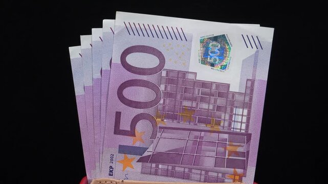 European money. Cash, finance, savings, wealth. Two and a half thousand euros in five 500 euro banknotes. Euro banknotes, EURO. 500 euro banknotes in wallet