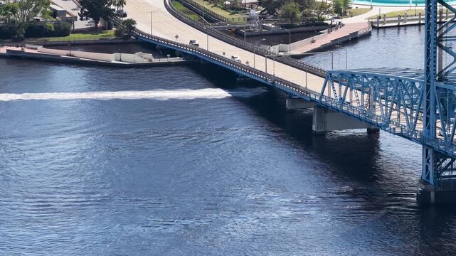 Aerial footage of cars driving on a bridge in Jacksonville Florida USA