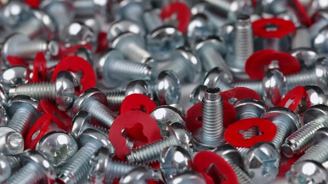 Metal screws for fastening equipment. Soft focus. Close-up. 