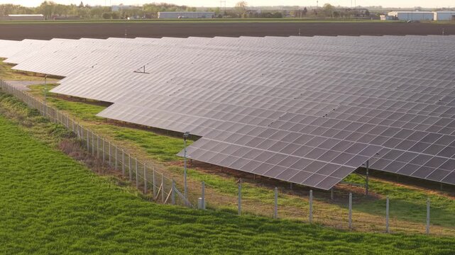 Solar Farm Aerial Perspective at Golden Hour Clean Electricity Generation