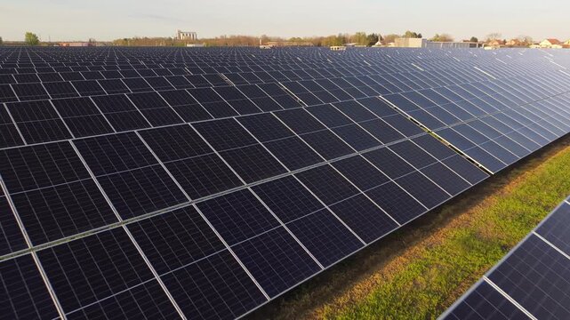 Photovoltaic Power Plant Aerial Drone View Solar Panels in Evening Light