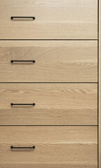 Neutral stain color on wooden white oak cabinetry with rift, plain and quarter sawn grain patterns 