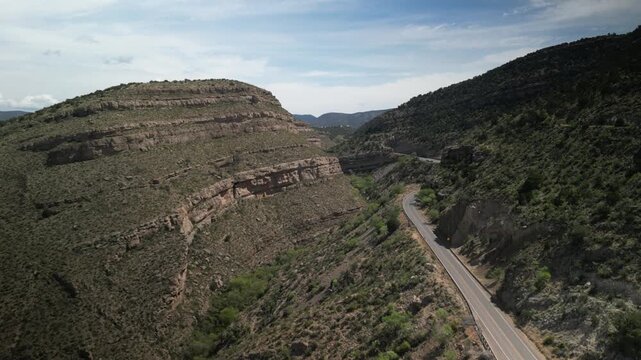 Aerial ascending high desert canyon in High Rolls New Mexico