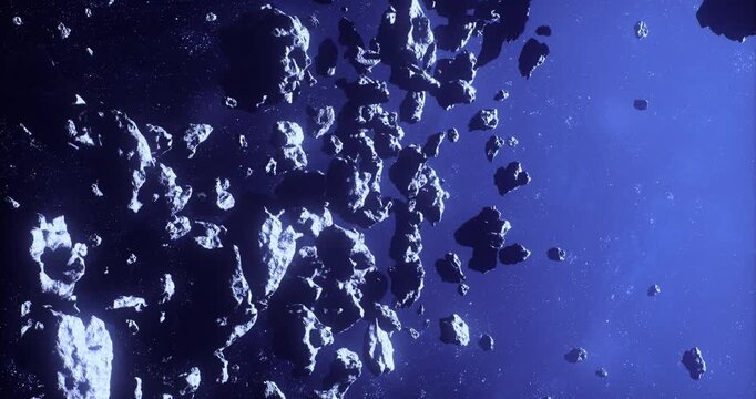 A cluster of asteroids floats amidst the vastness of space, illuminated by distant stars. This cosmic event showcases the unique formations and textures of these celestial bodies.