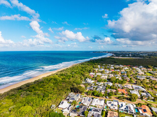Expansive Aerial View of Moffat Headland and Coastal Residences Bordering Pristine Beaches on Australia's Sunshine Coast, Queensland © Mujie
