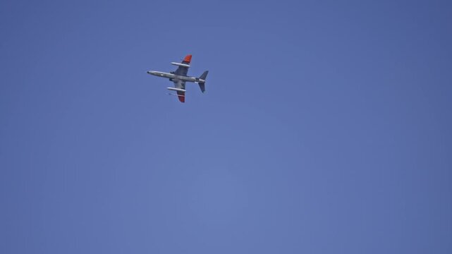Military Trainer Jet With Weapons Tracking Shot in Sky.
