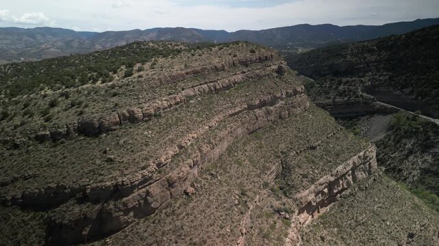 Aerial cliffs above Fresno Creek near High Rolls New Mexico in high desert mountains