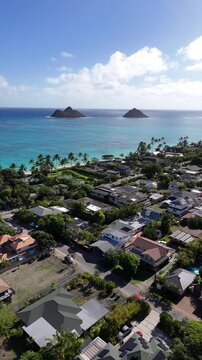 Na Mokulua aka Mokulua Islands or the Mokes off Lanikai Beach in Kailua town on the windward side of Oahu in the Hawaiian Islands. 