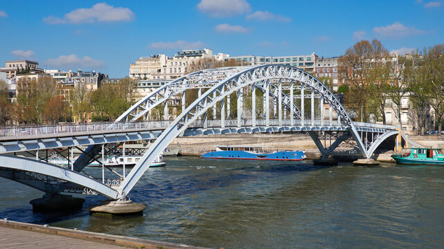 Pont de Bir-Hakeim bridge over Seine in spring with riverside buildings