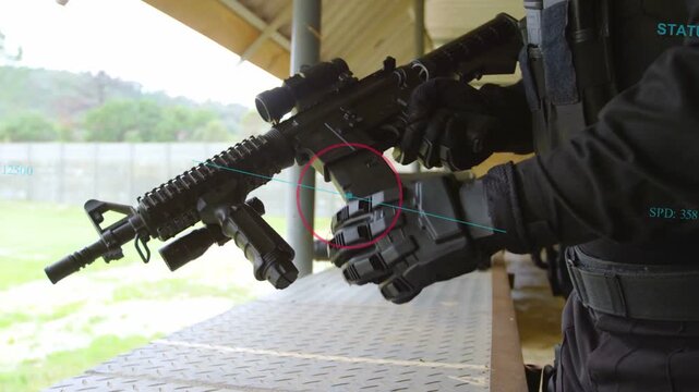 operator shifting hand and removing rotating seating mag during range training, HUD reticle guiding
