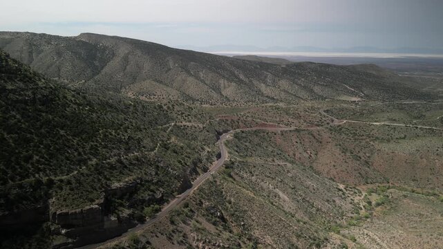 Aerial high desert mountains near High Rolls New Mexico in springtime along Highway 82