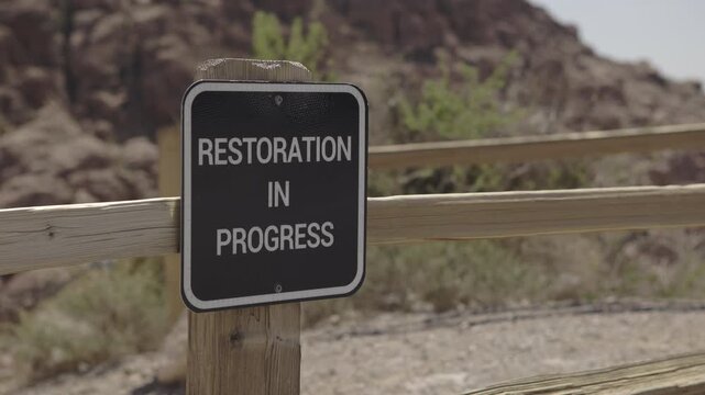 Sign in nature for Restoration in Progress 4k