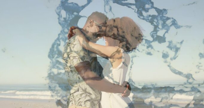 Romantic couple holding foreheads together on shore, overlay sliding down reframing couple for film