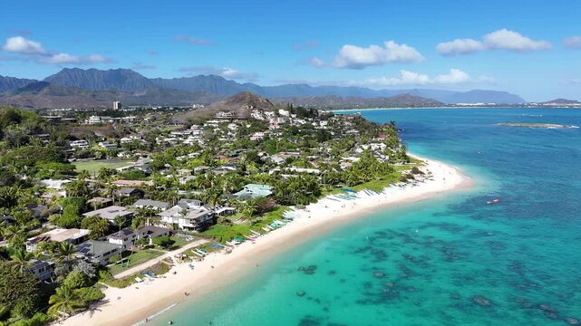 Beautiful coastline view along Lani Kai Beach with the Koolau Mountains in the background on the windward side of Oahu Island in Hawaii. 