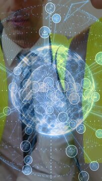 Vertical video: Site team tapping pad leaning to keep holo globe center showing nodes for site plan