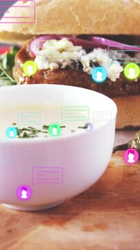 Vertical video: White soup bowl receiving incoming chat bubbles and avatar icons, promoting menu