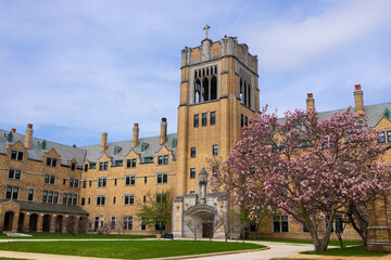 Dillon Hall at the University of Notre Dame standing under a spring sky