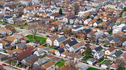 Fototapeta premium Aerial view of dense suburban residential neighborhood houses