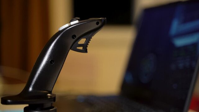 Close up of precision gaming joystick for flight simulation training