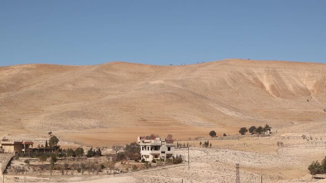 Scenic landscape view of the desert terrain and mountains surrounding Ma'aloula, Syria. Remote arid environment and geological formations near the historic Christian village