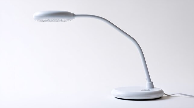 White LED desk lamp features a flexible arm on a rounded base against a white backdrop