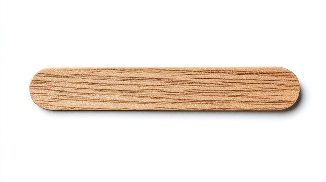 Isolated, close-up view of a light brown, wooden tongue depressor or similar shape, with a subtle shadow, centered on a white backdrop