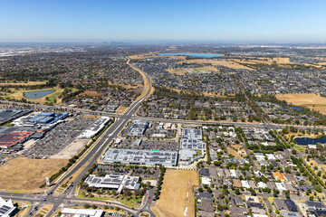 craigieburn aerial view suburb residential area commercial buildings parks roads retail development lakes housing estates green spaces aerial landscape victoria australia © Brett Price
