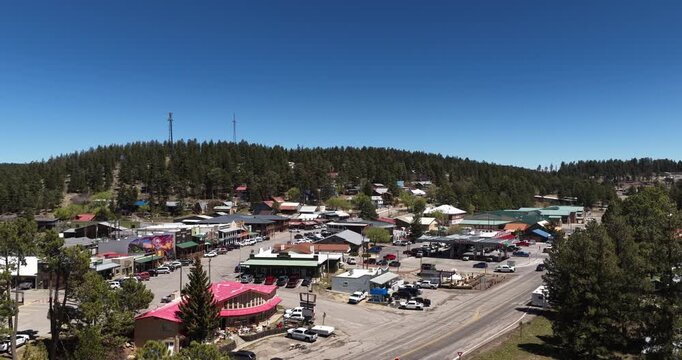 Aerial of Cloudcroft New Mexico mountain town on sunny spring day