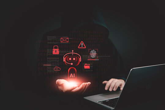 Anonymous cybercriminal typing on computer with virtual interface warning signs showing identity theft and malware risks.