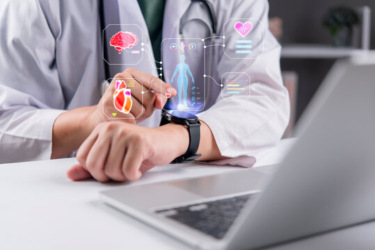 Doctor touching smartwatch hologram digital health human anatomy heart brain futuristic wearable technology medical telemedicine.