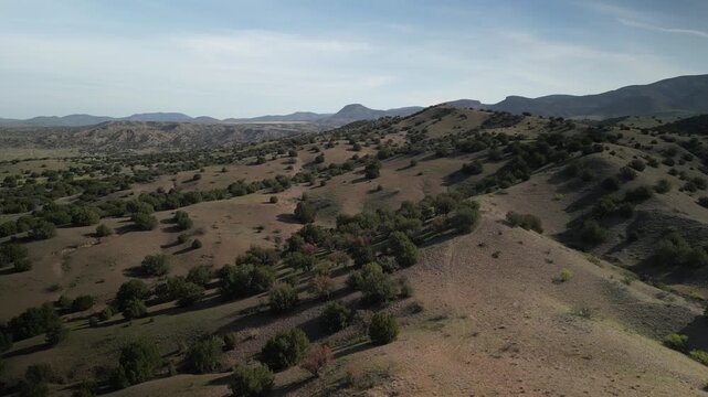 Aerial of Gila National Forest high desert hills near Reserve New Mexico in spring