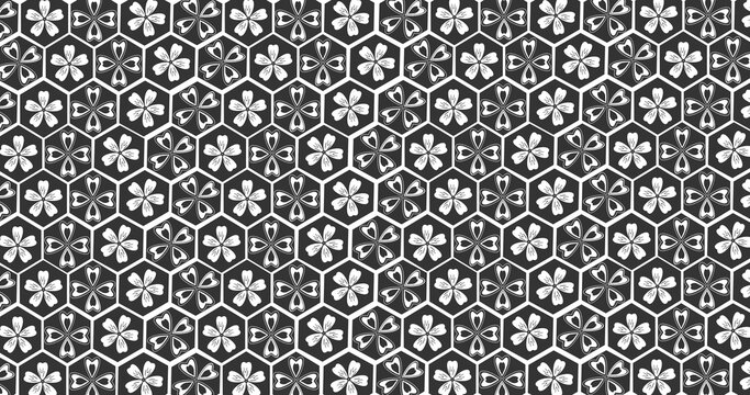 幾何学的なハニカムとクローバーのシームレスパターン（モノクロ・白黒・シンプル・ベクター素材）：Geometric honeycomb and clover seamless pattern. Simple monochrome black and white vector illustration for versatile background.
