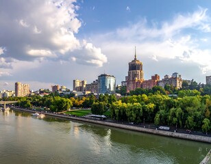 Obraz premium Cityscape showing waterfront, buildings, lush trees, and cloudy sky