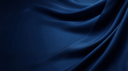 Luxurious dark blue satin fabric draped with elegant smooth waves, creating a deep and rich abstract background texture. © Talia