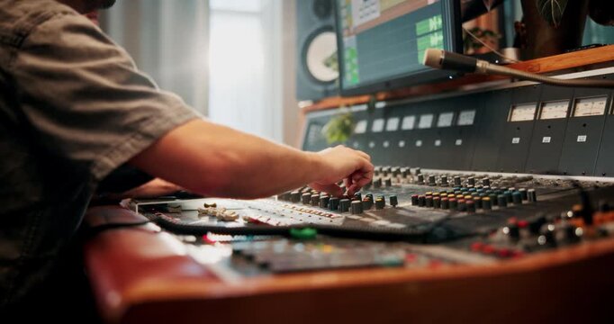 Production, music and hands of producers with headphones in studio working on album or song with computer. DJ, equipment and male sound technicians with technology for mixing audio in recording booth