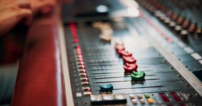 Mixing, hands and sound engineer in music studio with equipment, change volume and album production. Man, audio technician and creativity with technology for editing track, project and record label.