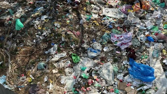 Trash pollution crisis harming earth through water pollution air pollution plastic polythene diapers waste destroying environment threatening health ecosystems future generations worldwide