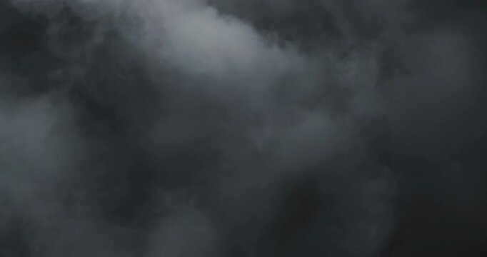 Cinematic 4K slow motion smoke and rolling fog forming an ethereal moody atmosphere with soft vapor texture rich depth and fluid motion, ideal for cinematic scenes, VFX, transitions, and abstract visu