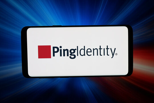Stuttgart, Germany - 03-31-2026: In this photo illustration, the logo of US software company Ping Identity Corporation is displayed on a smartphone in front of abstract background on computer screen.