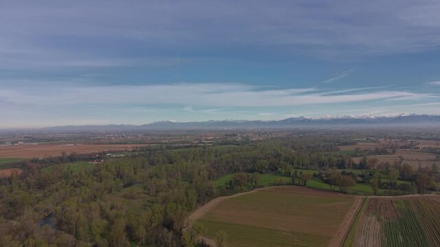 Aerial drone view of Parco Oglio Sud in Lombardy, Italy, featuring the winding Oglio River and surrounding natural landscape.