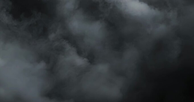 Cinematic 4K slow motion smoke and rolling fog forming an ethereal moody atmosphere with soft vapor texture rich depth and fluid motion, ideal for cinematic scenes, VFX, transitions, and abstract visu