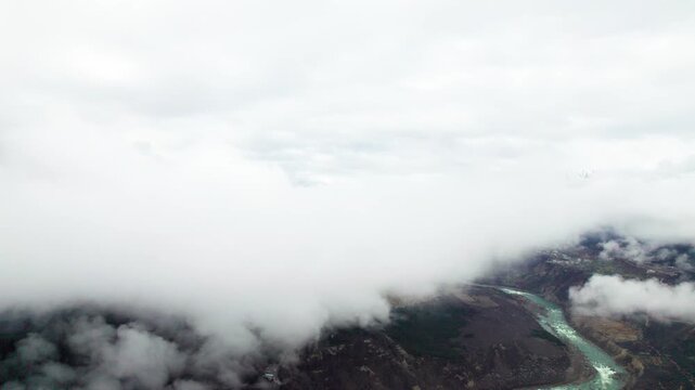 Drone view landscape of Grand Canyon of the Yarlung Zangbo River, beautiful green river viewed from clouds, 4k time lapse or hyper lapse footage b roll shot, travel concept.