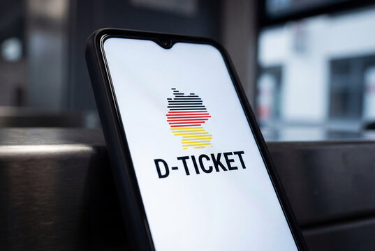 D-Ticket displayed on smartphone screen, digital Deutschlandticket for public transport, mobile app for German national travel and commuting
