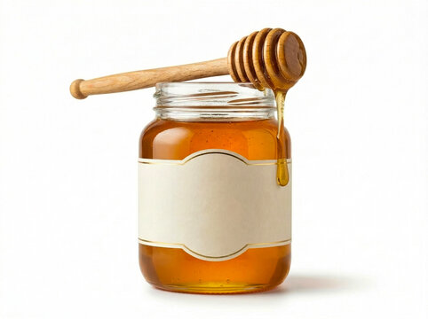 A glass jar of golden honey with a wooden dipper on top