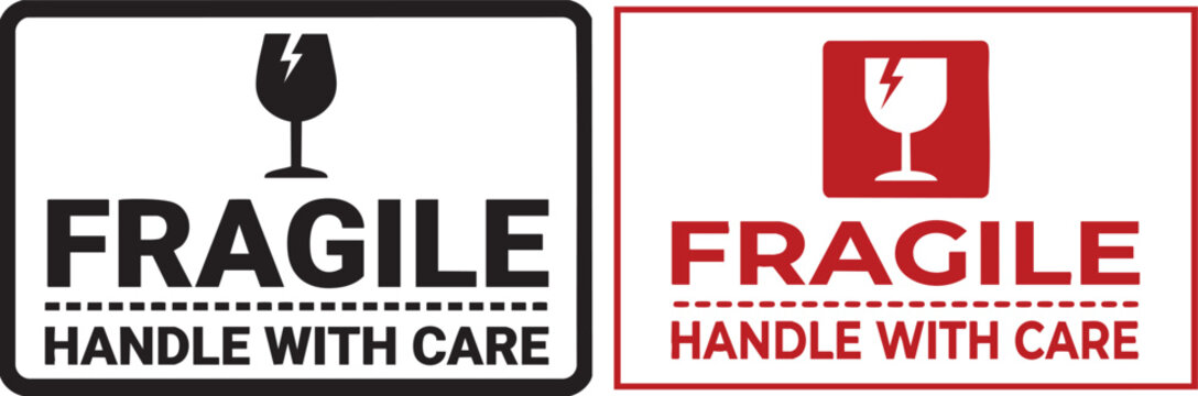 Two fragile handle with care warning signs one black and white and one red and white